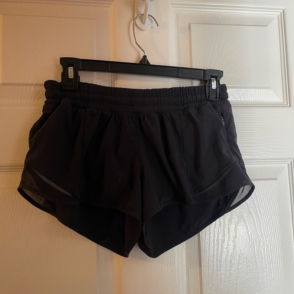 Size 4 black lululemon hotty hot shorts